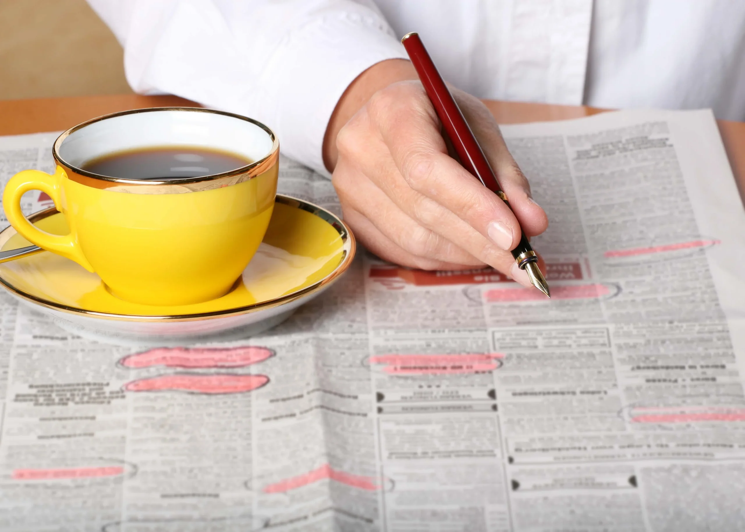 this is a photo of a person drinking coffee looking for job, and title loans can help them