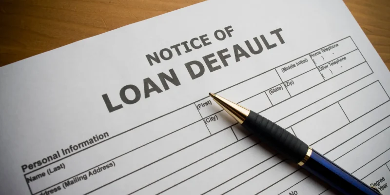 This is a photo of a paper form for filing title loan default