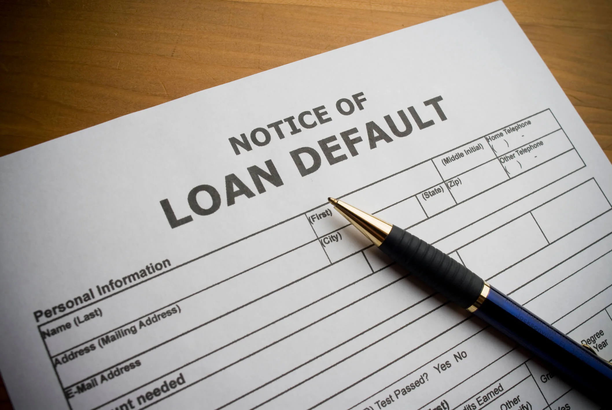 This is a photo of a paper form for filing title loan default