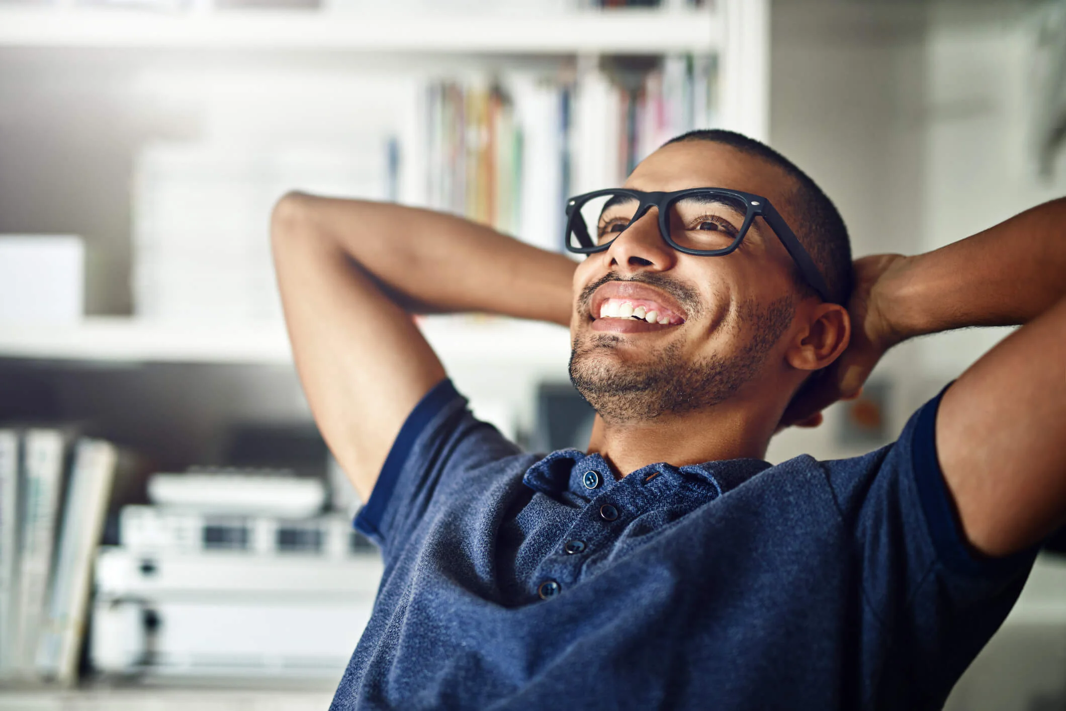 Photo of a man smiling and relaxed after going through a title loan relief program from titleloansonline.com